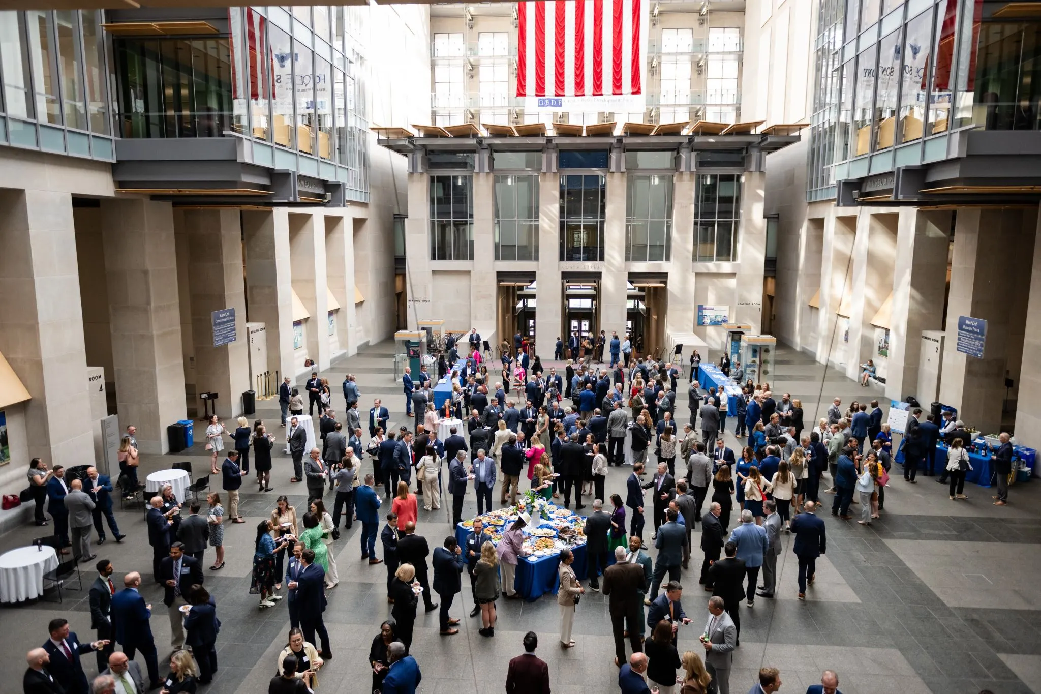 PRA event hall with people networking